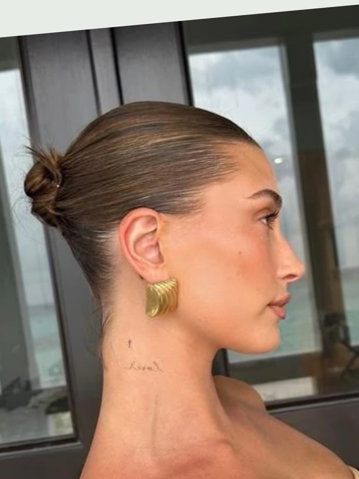 Hailey Bieber side portrait
