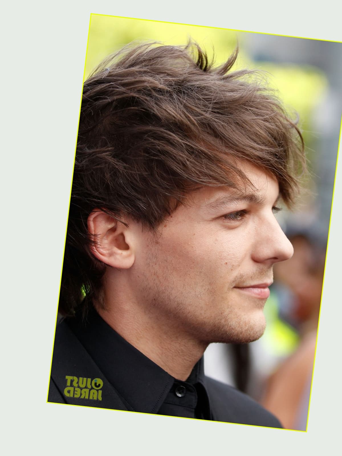 Louis Tomlinson side portrait